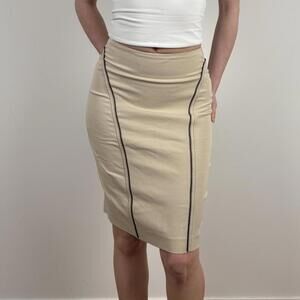 Vintage Italian Bebe cream skirt with black leather piping. Very office core.